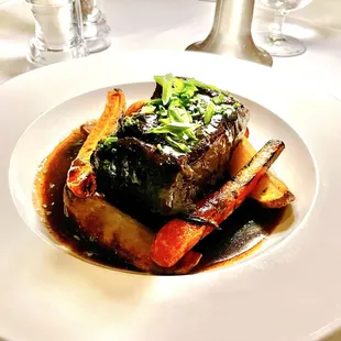 Braised short rib with root vegetables.
