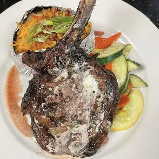 16oz Deluxe Texas Rib-eye steak.

Paired with vegetables and a choice of baked potato, mashed potato, or fries.