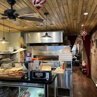 a view of the kitchen from the dining area