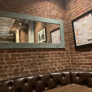 a brick wall and a mirror