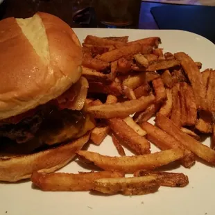 Peanut butter and bacon burger with fries.