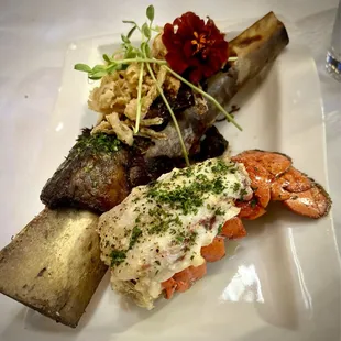 Beef rib with a side of lobster tail