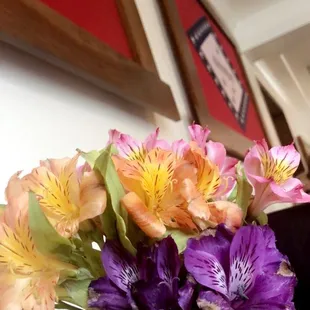 a vase of flowers on a table