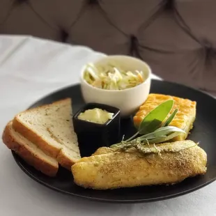 a plate of food with bread and butter