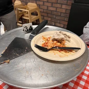 a half eaten pizza on a plate