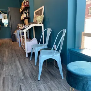 a row of chairs in a blue room