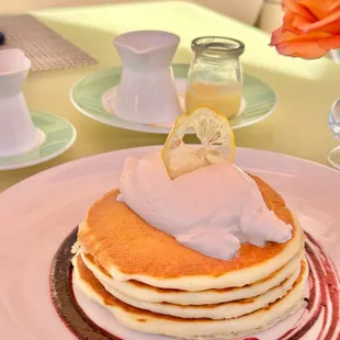 Pancakes-Lemon Ricotta, Blueberry Preserves, Lemon Curd, Whipped Cream.  -  tastes like regular pancakes.