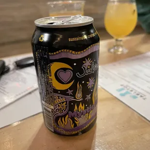 a can of beer on a table