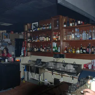 a man standing at the bar