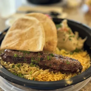 KEFTA KABAB BOWL. The two flavored rices were amazing with fresh hummus.