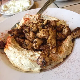 Hummus and chicken. Really really good! It's big enough for 2 to share.