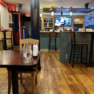 a wooden table and chairs
