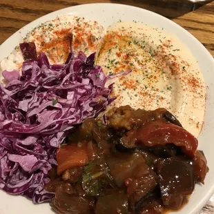 Combo Salad plate: tahine, hummus, red cabbage, chatzilim, Moroccan salad. $8