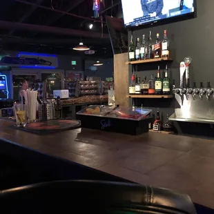 a bar with a flat screen tv