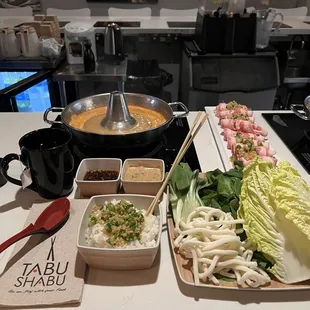 Spicy miso + tonkotsu pork broth, L Angus beef toro, veggies, &amp; rice (topped w green onions &amp; garlic)