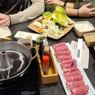 Wagyu short rib , veggies, udon, and two different broths!