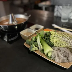 a plate of vegetables on a table