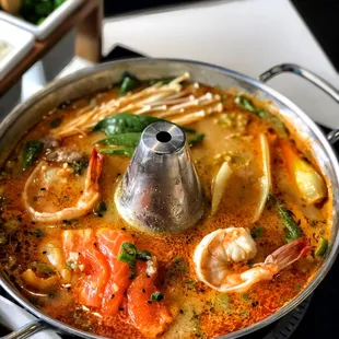 Spicy miso broth (GF, V) with veggies and sashimi grade salmon and Wild Mexican Shrimp