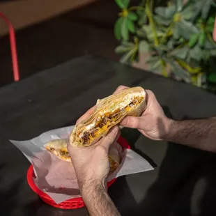 a man eating a sandwich