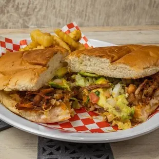 Mexican style sandwich or torta made with mexican telera bread and your choice of meat