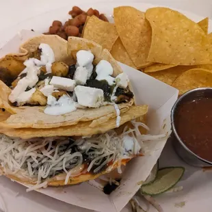 Veg taco, breakfast taco, chips and salsa, beans