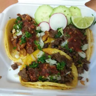 2 carne and 1 pollo Tacho Tacos