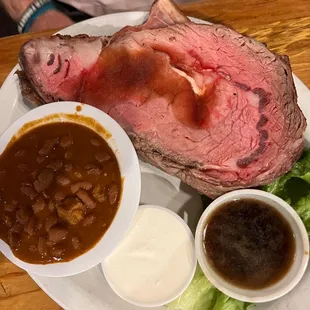 Prime. Rib with baked beans, horseradish sauce, and Au jus