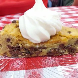 The cookie cake with vanilla ice cream