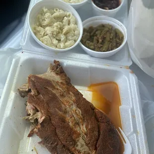 1/2 rack of Baby back ribs w/ sweet Carolina sauce on side,Mac &amp; cheese (white-cheese), &amp; green beans.