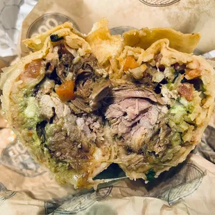 Cross-section of House Made Carnitas Burrito.