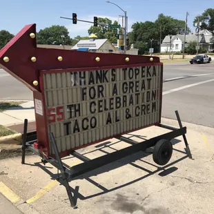 a sign on the corner of a street