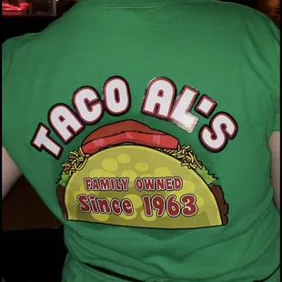 a man in a green shirt