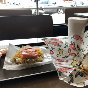 a tray of food and a drink