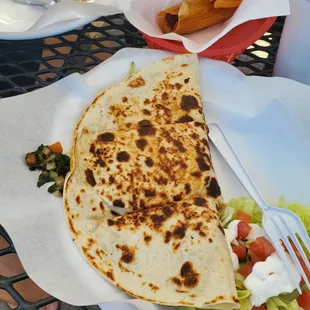 Large vgetable quesadilla (with tamale in the background)