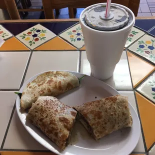 Spinach quesadilla, beef burrito and large Diet Coke, $13.00 w/tax