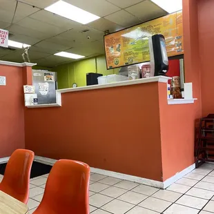 orange chairs and counters