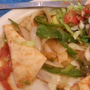 This is the fajitas style burrito. 80% onions. No mushrooms ? And they charge $8.50 for this onion burrito.... Not a good deal !