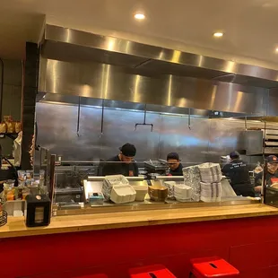 Bustling kitchen, feeding their takeout business