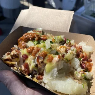 Loaded potatoes with everything from chipotle sauce, onion, cheese, bacon......seriously good!