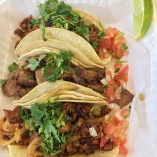 Chorizo taco; tripa taco; al pastor taco.