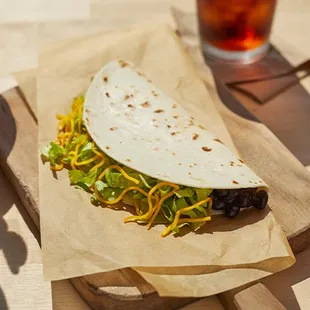 a tortilla on a cutting board