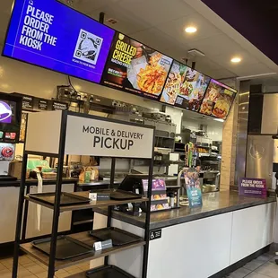 a view of the inside of a taco bell restaurant