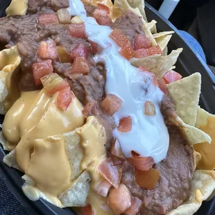 I order NO beans and extra ground beef. Slathered with beans and no beef in sight