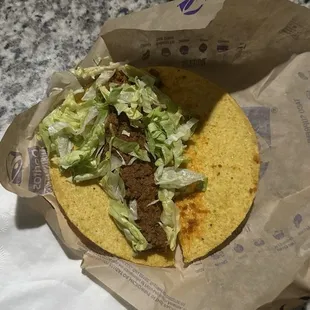 Broken Crunchy Taco. messy, no cheese...