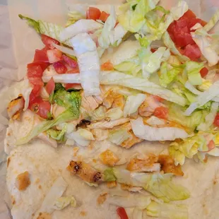 It's supposed to be a Chicken soft taco fresco style!! Its mostly lettuce, a few tomatoes and tiny bits of chicken! And I ordered 2 of them.