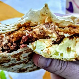 Soft Taco: warm, flour tortilla, seasoned beef, and cheese. $1.69
