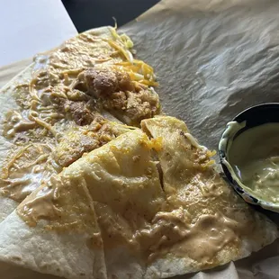 A quesadilla minus the cheese that makes it a quesadilla