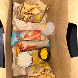 a variety of food items in a box