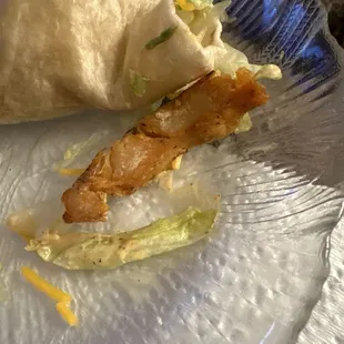 Chicken dried. It's so old you can see how it has become opaque and white on some of it.