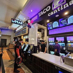 customers at the counter of a fast food restaurant